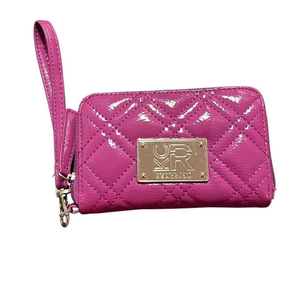 Kenneth Cole reaction pink wrist wallet. Excellent condition